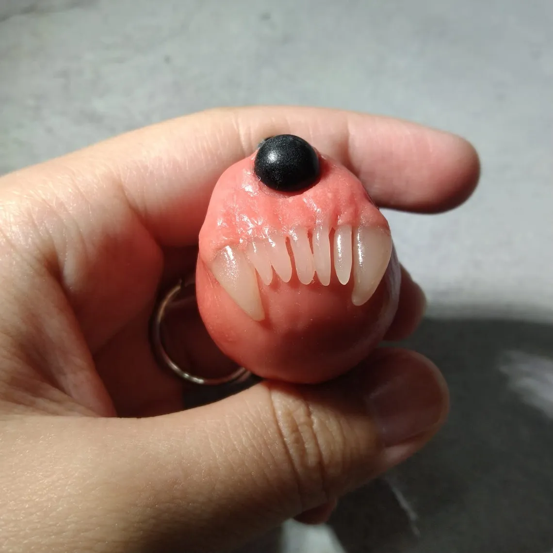 CYCLOPS FANGS KEYCHAIN