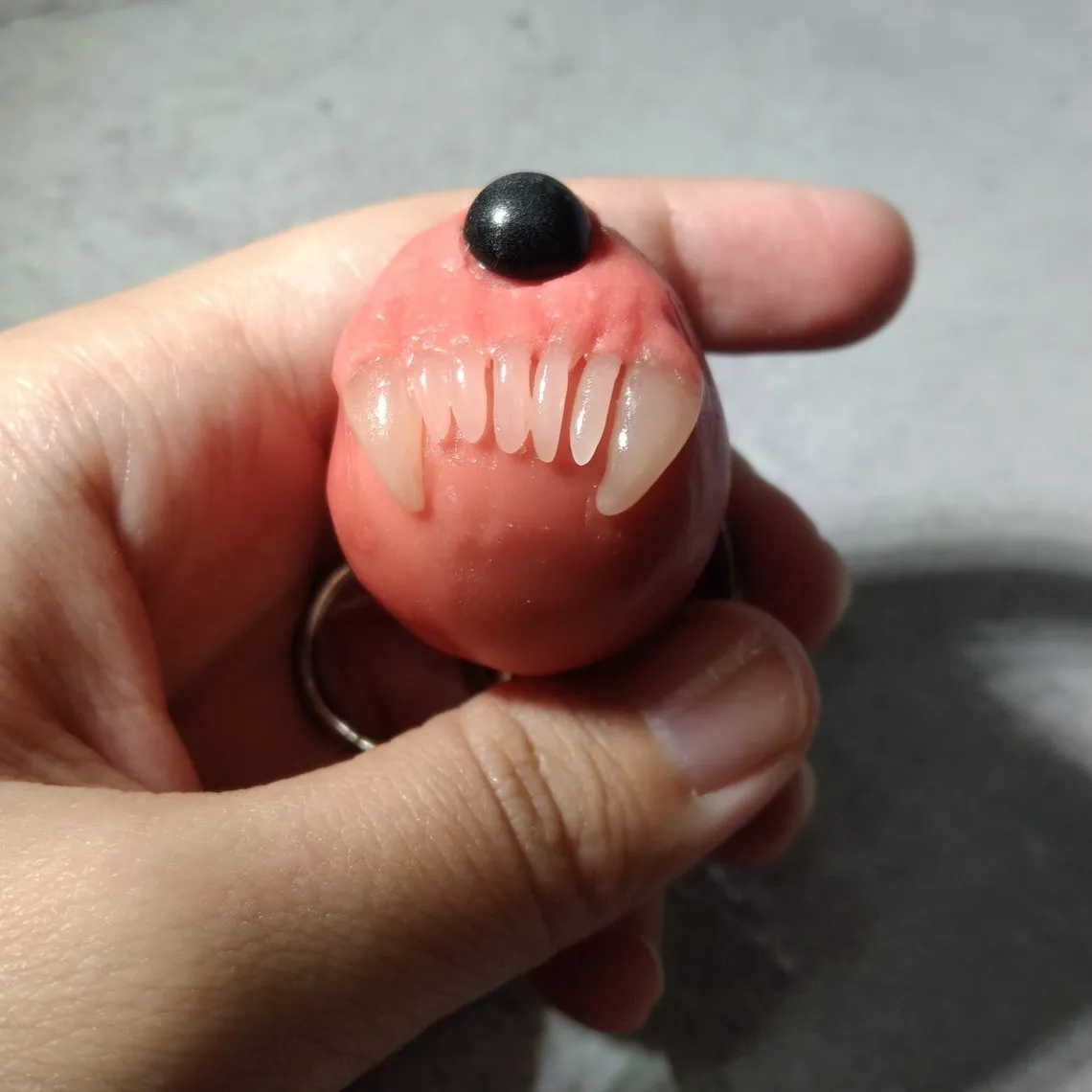 CYCLOPS FANGS KEYCHAIN